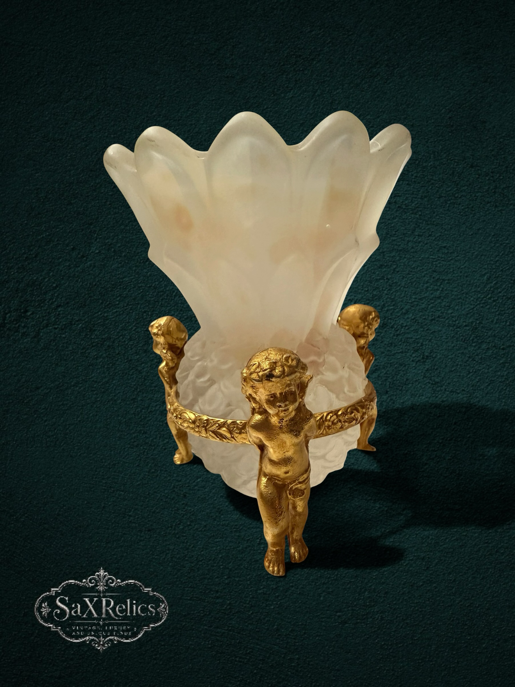 My Store ornate cherub glass vase with gilded bronze base and petal rim. Frosted glass with textured detail.