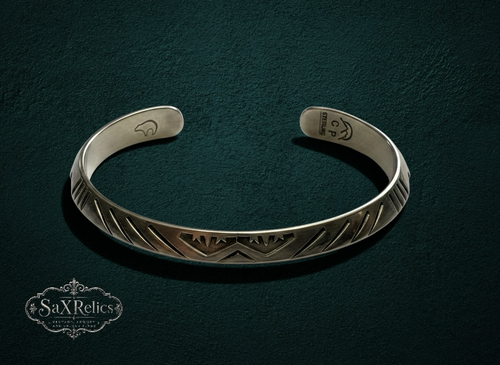 My Store handcrafted sterling silver cuff bracelet with intricate geometric engravings and vintage-inspired design.