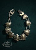My Store SAXRelics vintage silver-tone heart link bracelet with dual chain connectors and a decorative clasp.