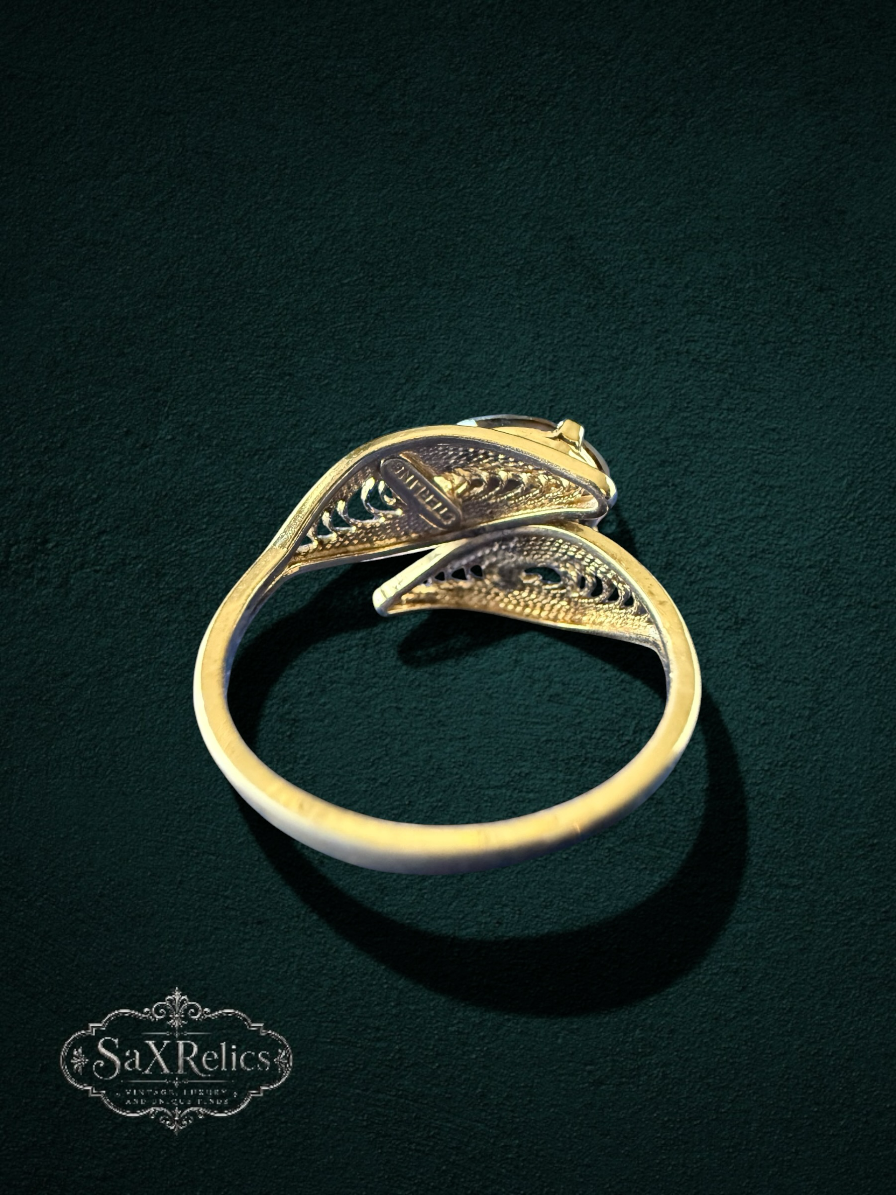My Store vintage sterling silver filigree statement ring with intricate metalwork and faceted smoky quartz gemstone.